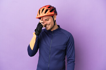 Young Brazilian cyclist man isolated on purple background laughing - obrazy, fototapety, plakaty