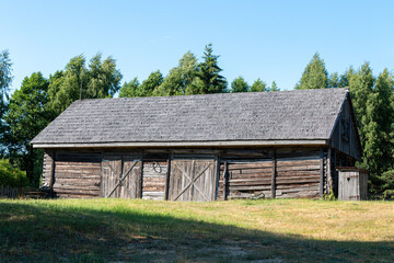 Fototapeta na wymiar An old wooden barn in the countryside