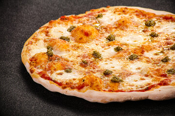 Italian Pizza with mozzarella and pesto
