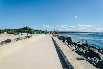 Low wide shot of the seaway promenade on the Gold Coast © DANE