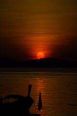 Longtail boat on the sea at sunrise&nbsp;in Adang-Ravi Islandsin,Tarutao National Park, Satun Thailand.
