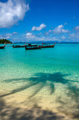 Fototapeta premium Anchored longtail taxi long tail boat,lipe island
