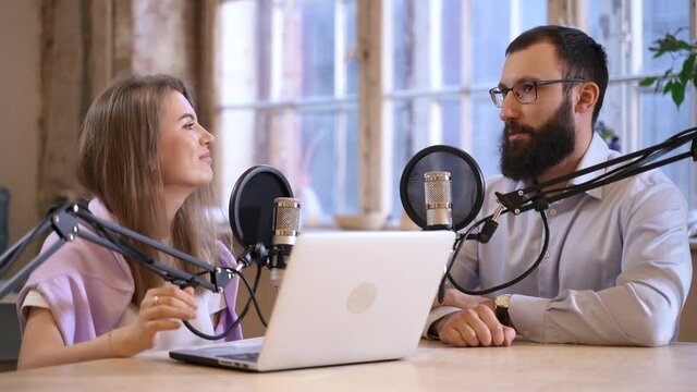 Businessman give interview on online podcast with woman announcer Spbas. Male entrepreneur talk