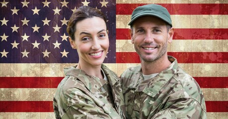 Composition of smiling male and female soldier embracing, against american flag