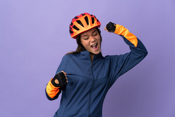 Teenager cyclist girl celebrating a victory