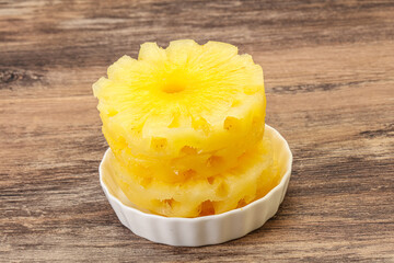 Sweet pineapple rings in the bowl