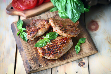 Selective focus. Appetizing juicy grilled steak. Close-up.