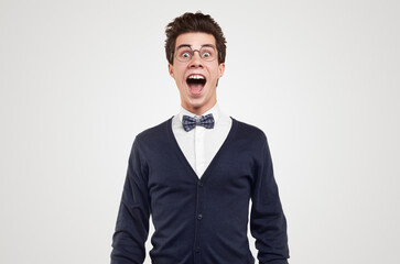 Funny amazed nerd man with mouth opened