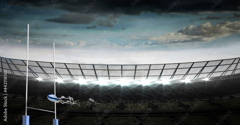 Wall mural Composition of empty rugby stadium and rugby ball over clouds