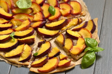 Crostata with peaches and fresh basil, tart
