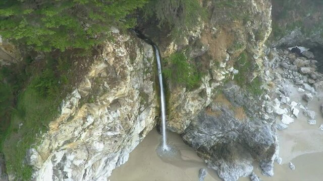 Aerial: Mcway Falls In Julia Pfeiffer Burns State Park In Big Sur