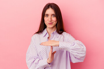 showing a timeout gesture.