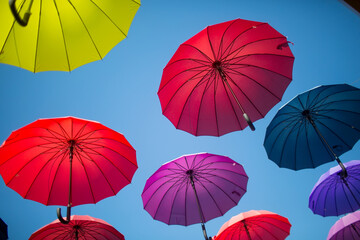 Colorful umbrellas against the sky.