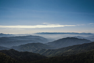 Fototapeta na wymiar High mountains, sea of ​​fog.