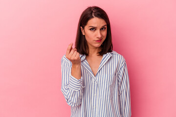 Young caucasian woman isolated on pink background showing that she has no money.