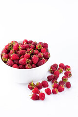 Isolated berries. Bunch of raspberry fruits with leaves isolated on white background, with clipping path