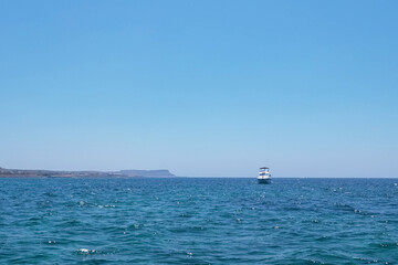 Naklejka premium The coast of the Mediterranean Sea. The waves. The horizon. Sky and sea in summer