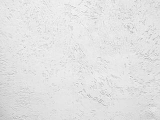 White textured stucco wall background. White stucco wall. Background of a white stucco coated and painted exterior, rough cast of cement and. White background. Abstract  wall grunge stone. 