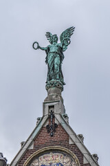 Architectural fragments of famous Rijksmuseum building (1885) in Amsterdam. Amsterdam Rijksmuseum holds many masterpiece paintings of Dutch and world art. Amsterdam, The Netherlands.