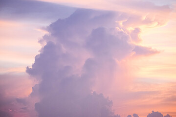 Evening sky sunset.  big puffy cumulus and long stratus clouds. sky background with clouds