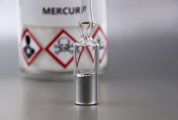 Mercury chemical element stock images. Laboratory accessories images. Mercury in a sealed ampoule...