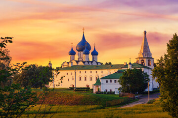 Fototapeta na wymiar Suzdal Kremlin and cathedral of Nativity at the Kamenka river, Russia. Summer day sunset
