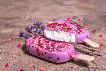 Lavender ice cream. Flower bouquet, pink rose petals