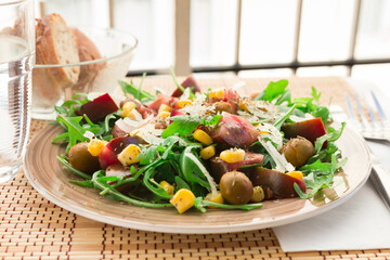fresh vegetarian healthy vegetable salad with arugula