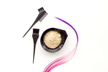 Colored hair with hairdresser tools hair dye, top view