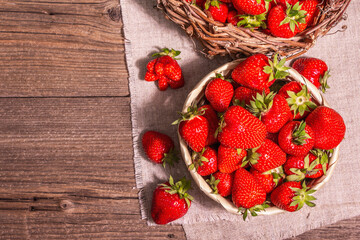 Fresh ripe strawberry in a wicker basket