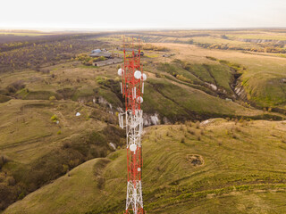 Telecommunication tower Antenna at sunset. Technology on the top of the telecommunication GSM 5G...