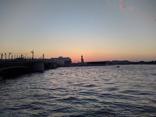 St. petersburg and the neva river in the evening in summer near the bridge.
