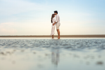 Fototapeta na wymiar a young couple on the beach.