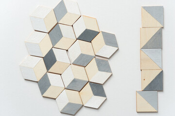 trompe l'oeil cubes loosely arranged on a white background