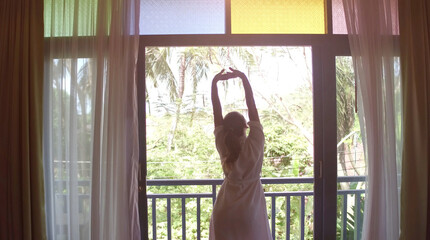 Young woman opening colorful doors and goes through. Travel Island concept video.