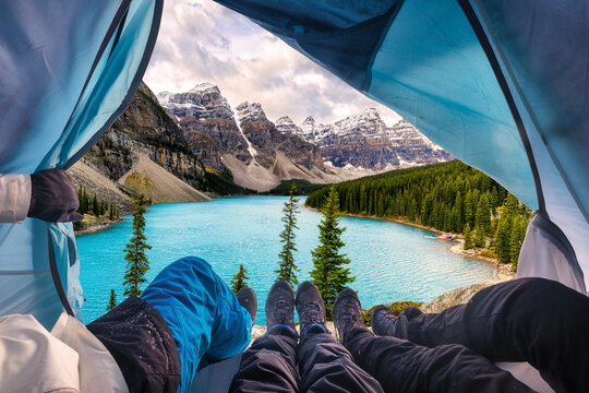 Group of mountaineer resting and enjoying view of Moraine Lake at national park