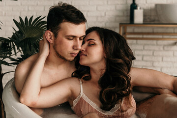 photo of young people in love taking a bath. mental rest. sexual instinct.carnal infatuation....