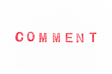 Red color rubber stamp in word comment on white paper background