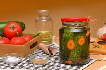 jar with canned cucumbers close-up on the kitchen table