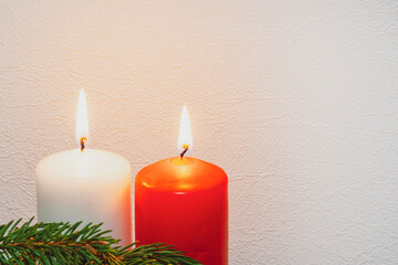 Obraz na płótnie Canvas spruce branches, candles,christmas background