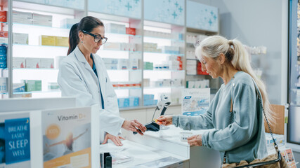 Pharmacy Drugstore Checkout Cashier Counter: Female Pharmacist Service Beautiful Senior Female...