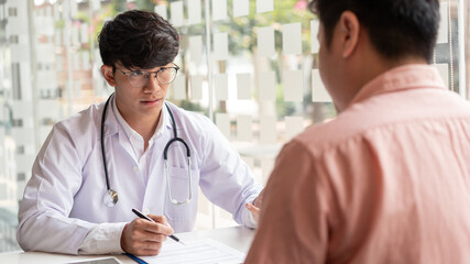 Diagnose,  A male patient listening a male doctor about diagnosis his symptoms after medical exam