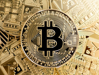 Fototapeta na wymiar closeup of a crypto currency of shiny golden bitcoin