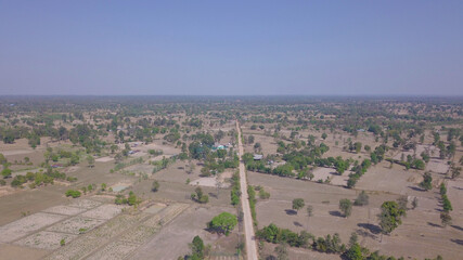 Naklejka premium Road and waste land, taken with a drone.