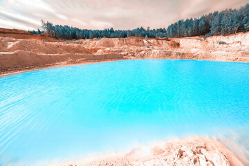 beautiful turquoise color of water in a kaolin quarry near the city of Kyshtym, Chelyabinsk region in Russia