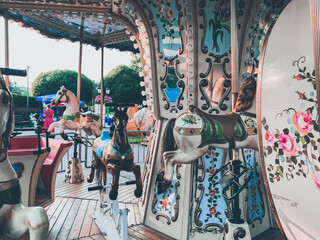 Retro children carousel in the park, empty carousel 