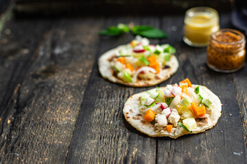 tacos stuffed vegetables doner kebab flatbread vegetable taco on the table healthy food meal snack copy space food background rustic. top view keto or paleo diet veggie vegan or vegetarian food