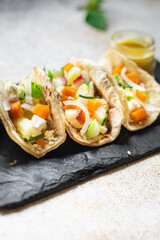 tacos stuffed vegetables doner kebab flatbread vegetable taco on the table healthy food meal snack copy space food background rustic. top view keto or paleo diet veggie vegan or vegetarian food