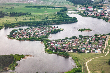 Fototapeta na wymiar View from airplane on Earth surface - river. the Volga River