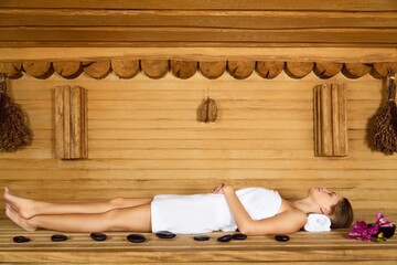 Woman Relaxing in the Sauna